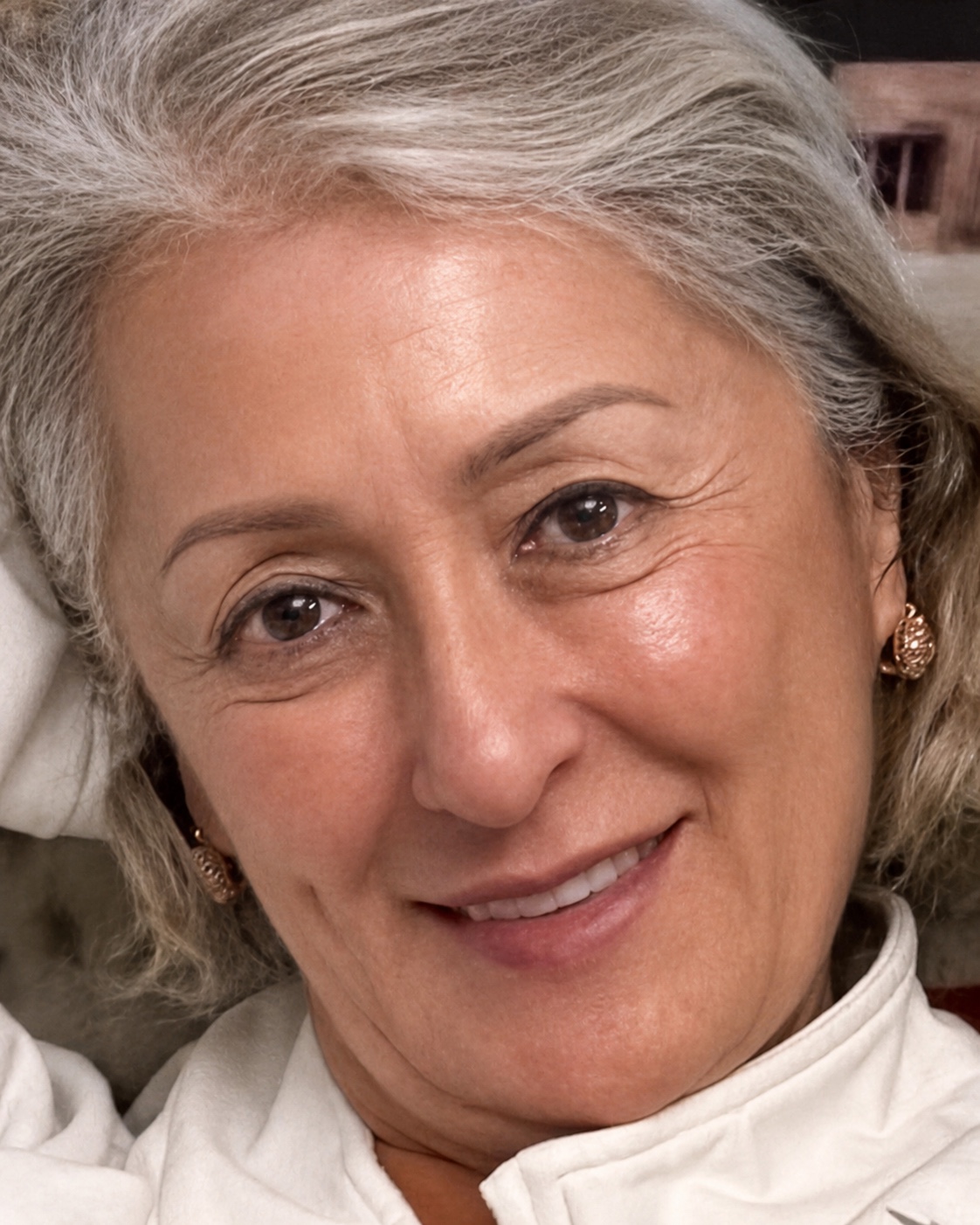 A close, relaxed portrait of Gulnara Karimova smiling.